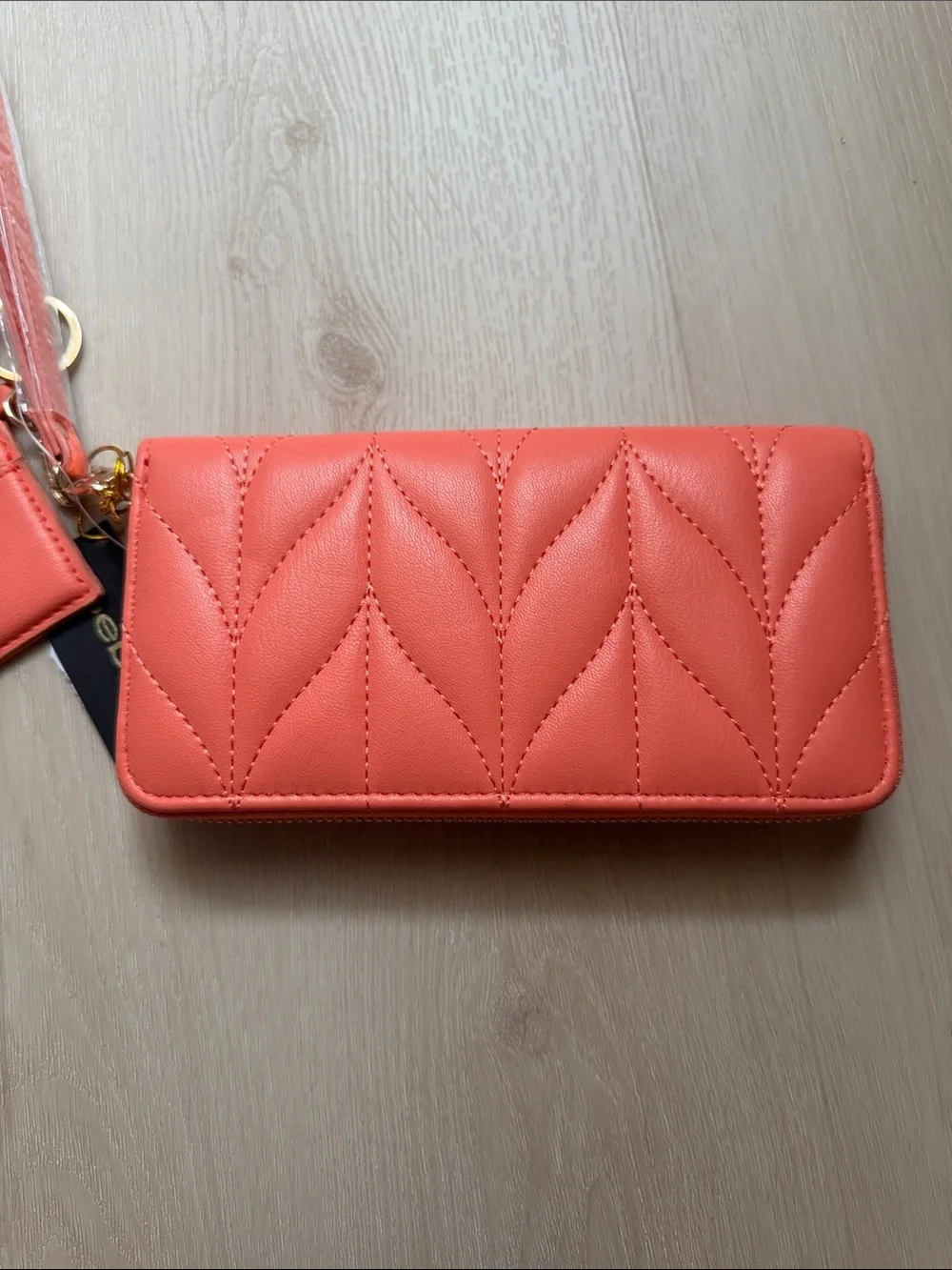 bebe Coral Quilted Wristlet Clutch with Gold Logo